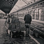 a man stands near a railroad car in Russia
