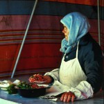 A Babushka sells salad at a train station in Siberia