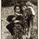 berber farmergirls two berber girls stand with bundles of fodder