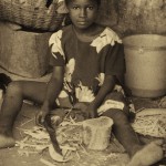 Girl in Kumasi Market girl in Kumasi market making splints