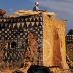 Gurunsi village woman rebuilds her home