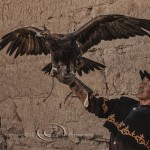 Kyrgyz Eagle Hunter with Golden Eagle wings outstretched