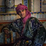 Portrait of an Uzbek: a young uzbek man dressed in traditional clothing
