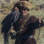 Hunter with his eagle perched on his arm