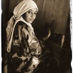 Egyptian girl weaving carpet