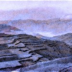 Black and white photograph of cultivated hills in China's red earth country tinted with shades of lavender and blue.