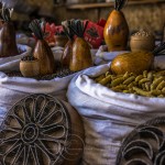 Spices, gourds, bread stamps are on display in a shop in Bokhara.